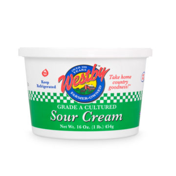Westby Cooperative Creamery Sour Cream in a 16 oz. container.