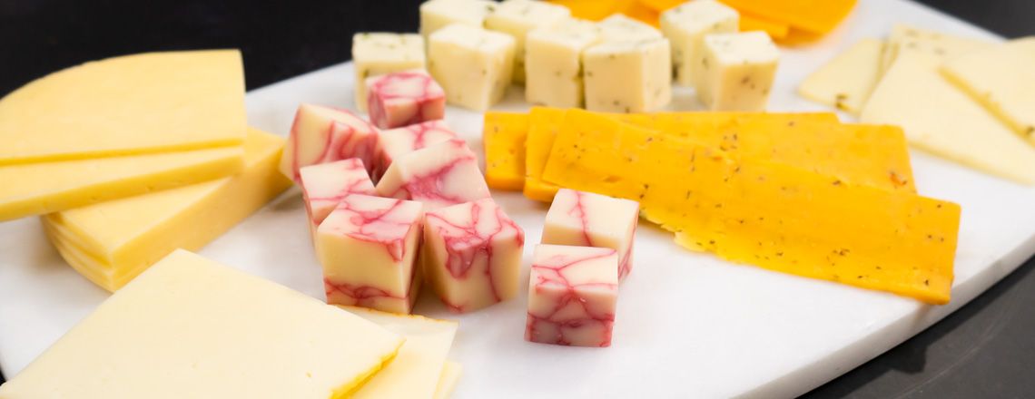 Charcuterie board of Wisconsin cheeses available for purchase online and at the Westby Cooperative Creamery Retail Store.