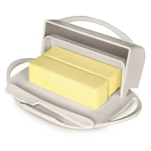 Butterie Box Butter Dish in the color ivory, with two sticks of butter stored inside.